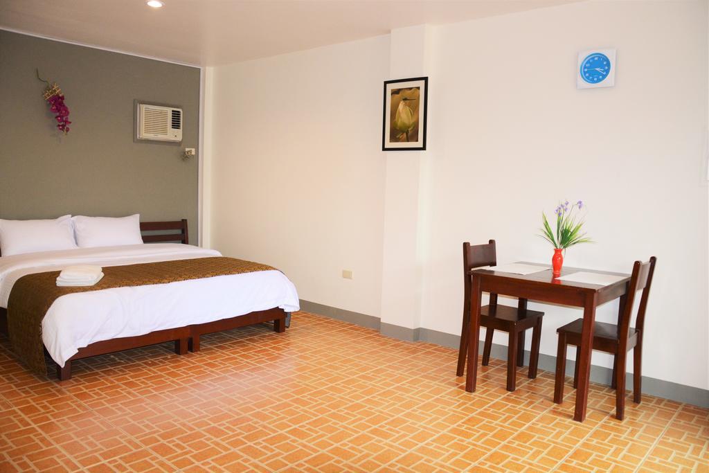 Alona Studios Apartment Hotel Panglao Exterior photo